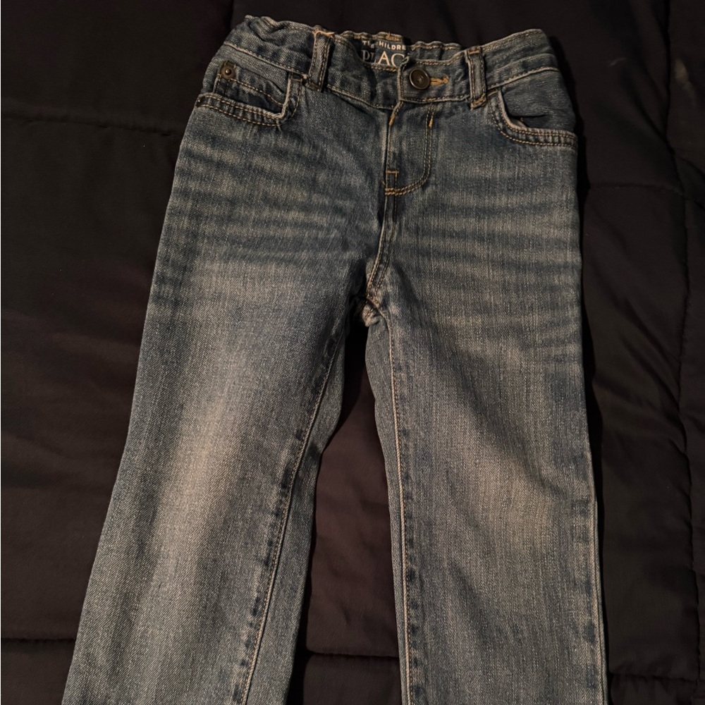 Children place denim jeans